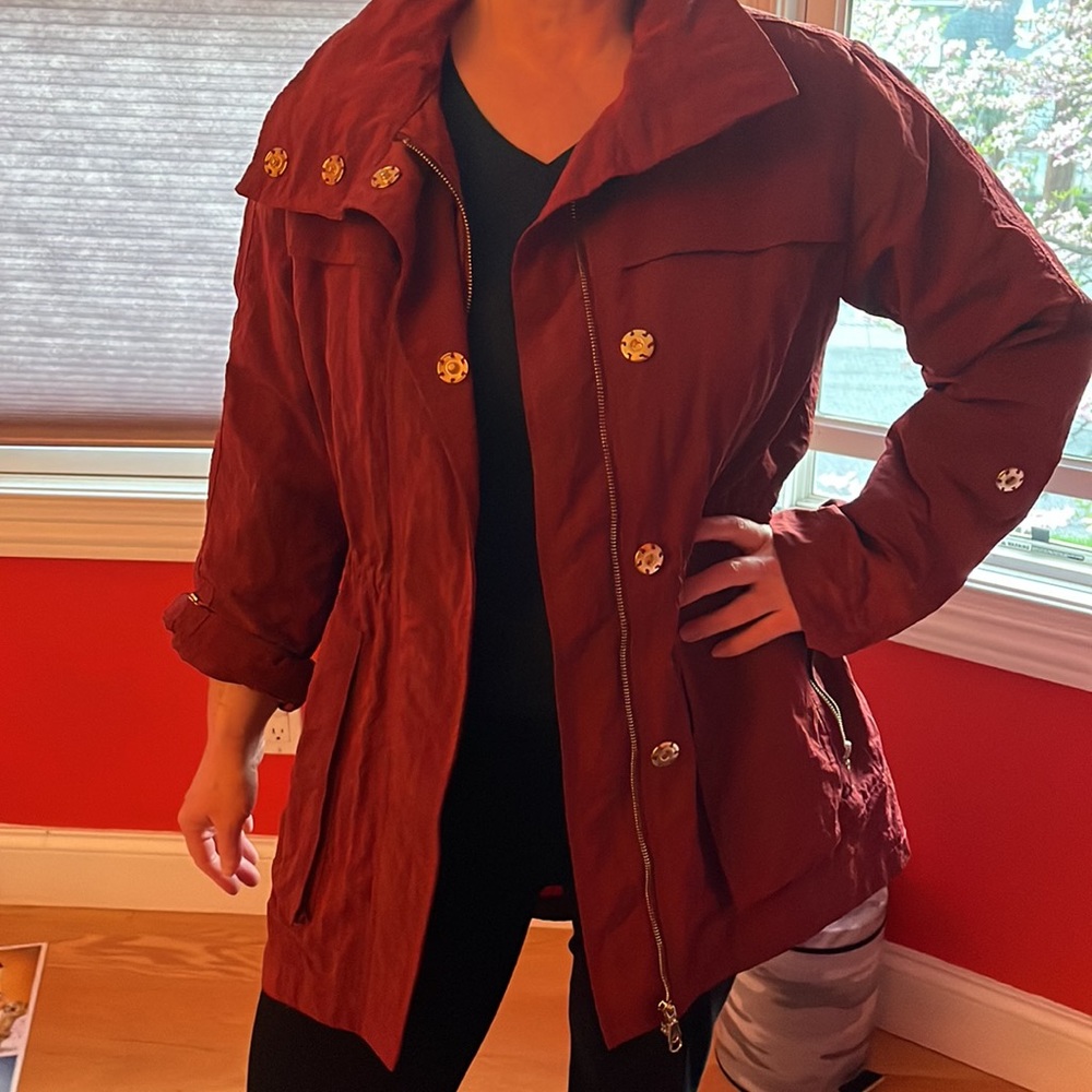 Water repellent spring/ fall maroon coat with golden buttons size M.